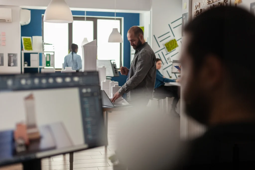 this shows a person sitting infront of screen